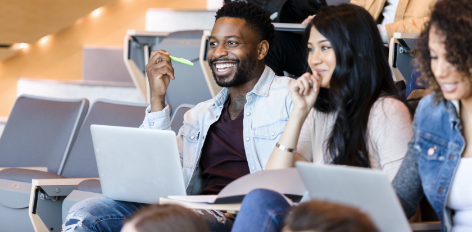 Students in class with laptops